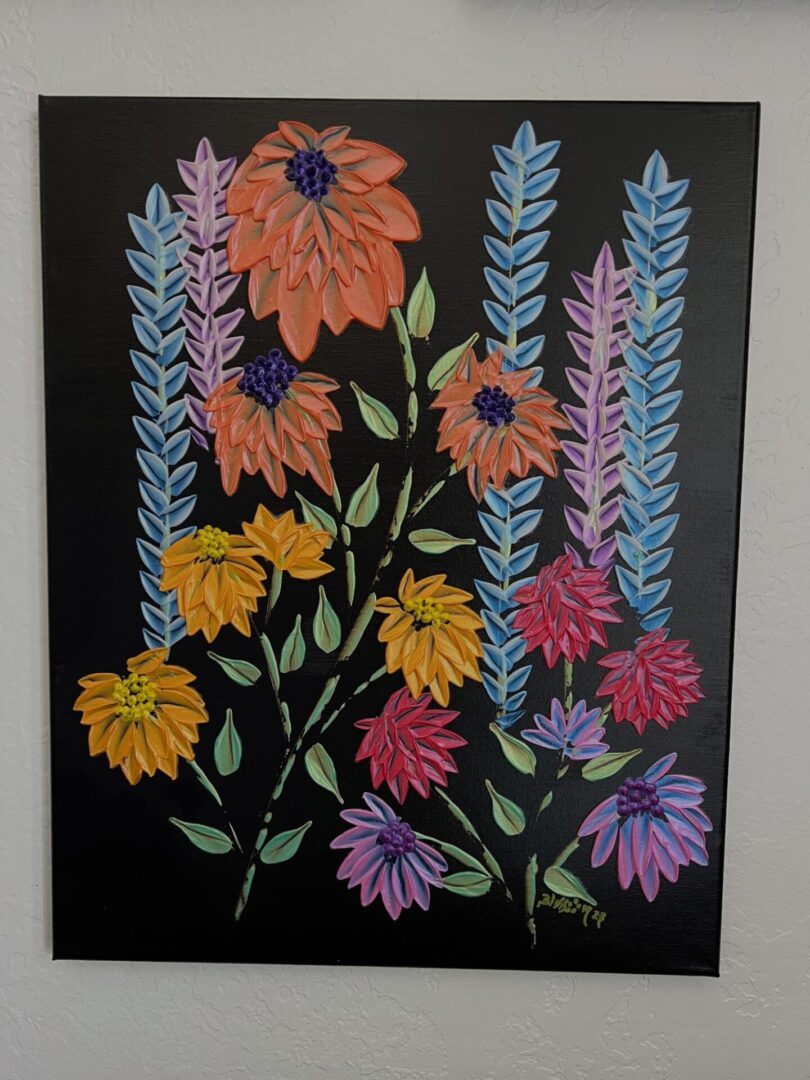 A painting of flowers on canvas