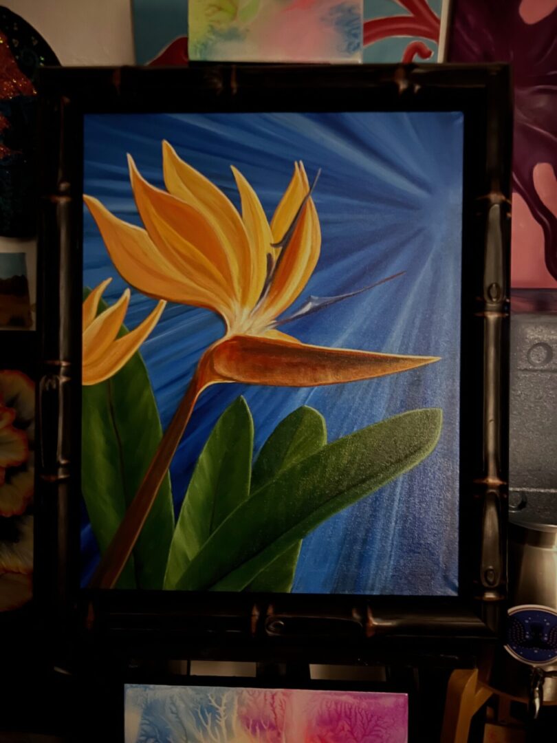 A painting of flowers on canvas in bamboo frame.